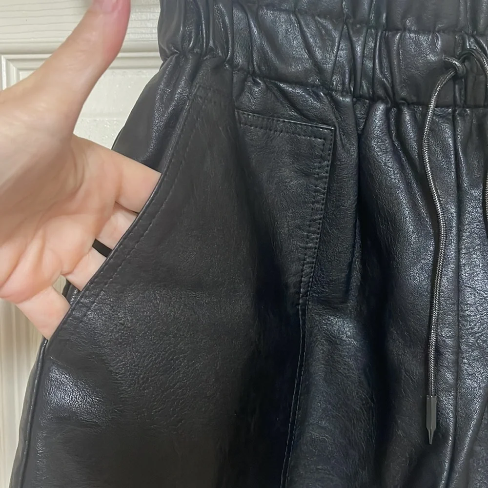 SCHHJZPJ size Medium pleather shorts. Black. Pockets. New!